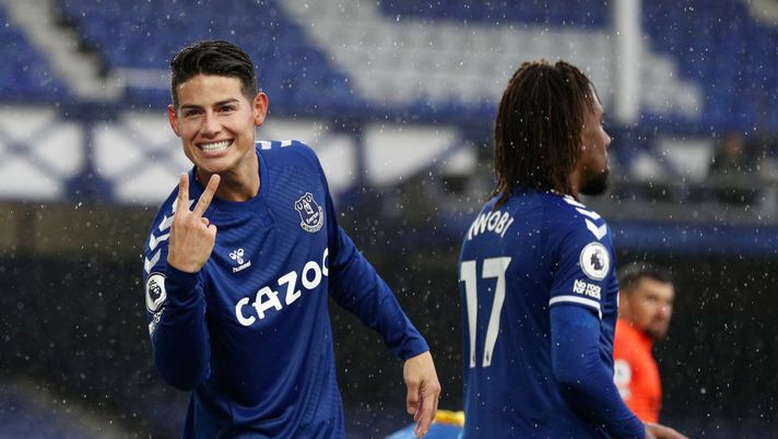 LIVERPOOL, ENGLAND - OCTOBER 03: James Rodriguez of Everton celebrates after scoring his team's fourth goal during the Premier League match between Everton and Brighton & Hove Albion at Goodison Park on October 03, 2020 in Liverpool, England. Sporting stadiums around the UK remain under strict restrictions due to the Coronavirus Pandemic as Government social distancing laws prohibit fans inside venues resulting in games being played behind closed doors. (Photo by Jan Kruger/Getty Images) LIVERPOOL, ENGLAND - OCTOBER 03: James Rodriguez of Everton celebrates after scoring his team's fourth goal during the Premier League match between Everton and Brighton & Hove Albion at Goodison Park on October 03, 2020 in Liverpool, England. Sporting stadiums around the UK remain under strict restrictions due to the Coronavirus Pandemic as Government social distancing laws prohibit fans inside venues resulting in games being played behind closed doors. (Photo by Jan Kruger/Getty Images)