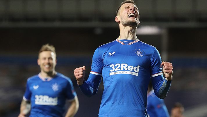 GLASGOW, SCOTLAND - FEBRUARY 25: Borna Barisic of Rangers celebrates after he scores his team's fourth goal during the UEFA Europa League Round of 32 match between Rangers FC and Royal Antwerp FC at on February 25, 2021 in Glasgow, Scotland. Sporting stadiums around the UK remain under strict restrictions due to the Coronavirus Pandemic as Government social distancing laws prohibit fans inside venues resulting in games being played behind closed doors. (Photo by Ian MacNicol/Getty Images) GLASGOW, SCOTLAND - FEBRUARY 25: Borna Barisic of Rangers celebrates after he scores his team's fourth goal during the UEFA Europa League Round of 32 match between Rangers FC and Royal Antwerp FC at on February 25, 2021 in Glasgow, Scotland. Sporting stadiums around the UK remain under strict restrictions due to the Coronavirus Pandemic as Government social distancing laws prohibit fans inside venues resulting in games being played behind closed doors. (Photo by Ian MacNicol/Getty Images)
