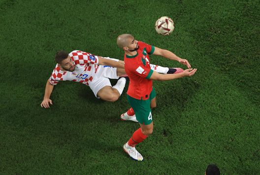 DOHA, QATAR - DECEMBER 17: Sofyan Amrabat of Morocco controls the ball against Nikola Vlasic of Croatia during the FIFA World Cup Qatar 2022 3rd Place match between Croatia and Morocco at Khalifa International Stadium on December 17, 2022 in Doha, Qatar. (Photo by Buda Mendes/Getty Images) Amrabat: “Stavo per saltare una gara del Mondiale per colpa di un parastinco”- immagine 2
