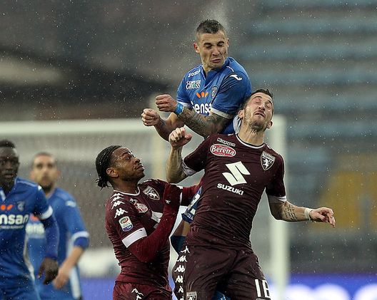 EMPOLI, ITALY - FEBRUARY 05: Rade Krunic of Empoli Fc in action agaist Joel Obi (L) and Mirko Valdifiori (R) of FC Torino during the Serie A match between Empoli FC and FC Torino at Stadio Carlo Castellani on February 5, 2017 in Empoli, Italy. (Photo by Gabriele Maltinti/Getty Images) EMPOLI, ITALY - FEBRUARY 05: Rade Krunic of Empoli Fc in action agaist Joel Obi (L) and Mirko Valdifiori (R) of FC Torino during the Serie A match between Empoli FC and FC Torino at Stadio Carlo Castellani on February 5, 2017 in Empoli, Italy. (Photo by Gabriele Maltinti/Getty Images)
