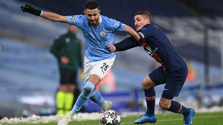 MANCHESTER, ENGLAND - MAY 04: Riyad Mahrez of Manchester City battles for possession with Marco Verratti of Paris Saint-Germain during the UEFA Champions League Semi Final Second Leg match between Manchester City and Paris Saint-Germain at Etihad Stadium on May 04, 2021 in Manchester, England. Sporting stadiums around the UK remain under strict restrictions due to the Coronavirus Pandemic as Government social distancing laws prohibit fans inside venues resulting in games being played behind closed doors. (Photo by Laurence Griffiths/Getty Images) MANCHESTER, ENGLAND - MAY 04: Riyad Mahrez of Manchester City battles for possession with Marco Verratti of Paris Saint-Germain during the UEFA Champions League Semi Final Second Leg match between Manchester City and Paris Saint-Germain at Etihad Stadium on May 04, 2021 in Manchester, England. Sporting stadiums around the UK remain under strict restrictions due to the Coronavirus Pandemic as Government social distancing laws prohibit fans inside venues resulting in games being played behind closed doors. (Photo by Laurence Griffiths/Getty Images)
