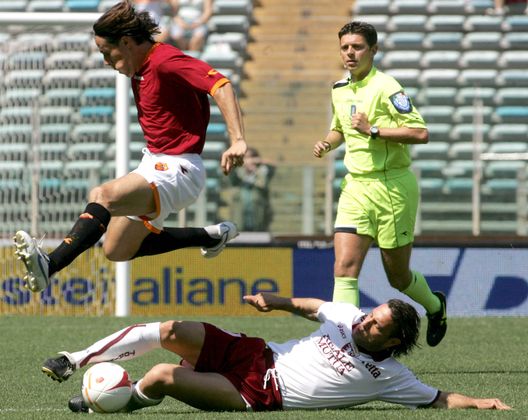 ROME, ITALY - MAY 13: Rodrigo Taddei of Roma skips a challenge from Roberto Muzzi of Torino during the Serie A match between Roma and Torino at the Stadio Olimpico, on May 13, 2007 in Rome Italy. (Photo by Newpress/Getty Images) ROME, ITALY - MAY 13: Rodrigo Taddei of Roma skips a challenge from Roberto Muzzi of Torino during the Serie A match between Roma and Torino at the Stadio Olimpico, on May 13, 2007 in Rome Italy. (Photo by Newpress/Getty Images)