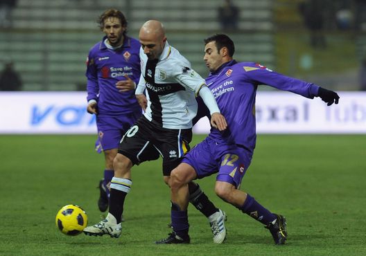 PARMA, ITALY - DECEMBER 14: Francesco Valiani of Parma FC takes on Marco Marchionni of ACF Fiorentina during the Tim Cup match between Parma FC and ACF Fiorentina at Stadio Ennio Tardini on December 14, 2010 in Parma, Italy. (Photo by Valerio Pennicino/Getty Images) PARMA, ITALY - DECEMBER 14: Francesco Valiani of Parma FC takes on Marco Marchionni of ACF Fiorentina during the Tim Cup match between Parma FC and ACF Fiorentina at Stadio Ennio Tardini on December 14, 2010 in Parma, Italy. (Photo by Valerio Pennicino/Getty Images)