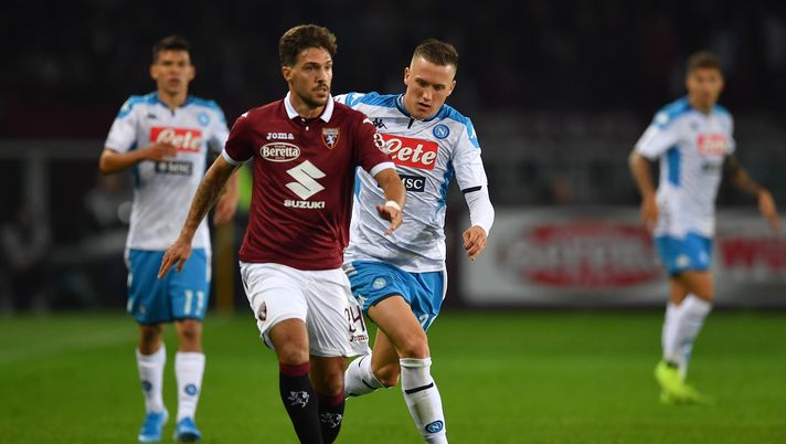 TURIN, ITALY - OCTOBER 06:  Simone Verdi (L) of Torino FC is challenged by Piotr Zielinski of SSC Napoli during the Serie A match between Torino FC and SSC Napoli at Stadio Olimpico di Torino on October 6, 2019 in Turin, Italy.  (Photo by Valerio Pennicino/Getty Images) 