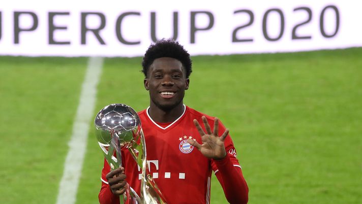MUNICH, GERMANY - SEPTEMBER 30: Alphonos Davies of FC Bayern Muenchen celebrates with the Supercup trophy after the Supercup 2020 match between FC Bayern München and Borussia Dortmund at Allianz Arena on September 30, 2020 in Munich, Germany. (Photo by Alexander Hassenstein/Getty Images ) MUNICH, GERMANY - SEPTEMBER 30: Alphonos Davies of FC Bayern Muenchen celebrates with the Supercup trophy after the Supercup 2020 match between FC Bayern München and Borussia Dortmund at Allianz Arena on September 30, 2020 in Munich, Germany. (Photo by Alexander Hassenstein/Getty Images )