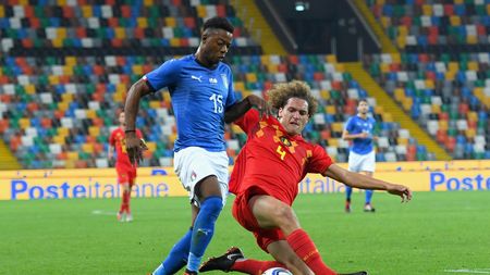 UDINE, ITALY - OCTOBER 11: Claud Adjapong of Italy U21 competes for the ball with Wout Faes of Belgium U21 during the International Friendly match between Italy U21 and Belgium U21 at Friuli Stadium on October 11, 2018 in Udine, Italy. (Photo by Alessandro Sabattini/Getty Images)