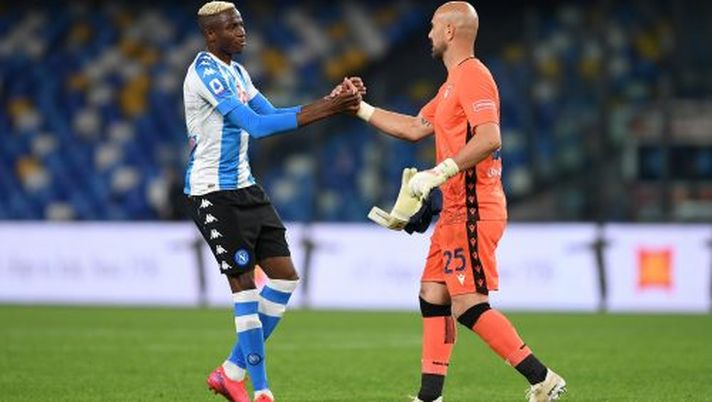 NAPLES, ITALY - APRIL 22: Victor Osimhen of SSC Napoli and Pepe Reina of S.S. Lazio interact during the Serie A match between SSC Napoli and SS Lazio at Stadio Diego Armando Maradona on April 22, 2021 in Naples, Italy. Sporting stadiums around Italy remain under strict restrictions due to the Coronavirus Pandemic as Government social distancing laws prohibit fans inside venues resulting in games being played behind closed doors. (Photo by Francesco Pecoraro/Getty Images) NAPLES, ITALY - APRIL 22: Victor Osimhen of SSC Napoli and Pepe Reina of S.S. Lazio interact during the Serie A match between SSC Napoli and SS Lazio at Stadio Diego Armando Maradona on April 22, 2021 in Naples, Italy. Sporting stadiums around Italy remain under strict restrictions due to the Coronavirus Pandemic as Government social distancing laws prohibit fans inside venues resulting in games being played behind closed doors. (Photo by Francesco Pecoraro/Getty Images)