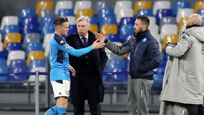 NAPLES, ITALY - DECEMBER 10: Piotr Zielinski of SSC Napoli greets Carlo Ancelotti SSC Napoli coach and his assistant Davide Ancelotti during the UEFA Champions League group E match between SSC Napoli and KRC Genk at Stadio San Paolo on December 10, 2019 in Naples, Italy. (Photo by Francesco Pecoraro/Getty Images) NAPLES, ITALY - DECEMBER 10: Piotr Zielinski of SSC Napoli greets Carlo Ancelotti SSC Napoli coach and his assistant Davide Ancelotti during the UEFA Champions League group E match between SSC Napoli and KRC Genk at Stadio San Paolo on December 10, 2019 in Naples, Italy. (Photo by Francesco Pecoraro/Getty Images)