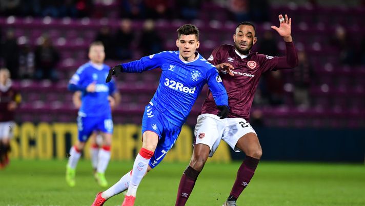 EDINBURGH, SCOTLAND - FEBRUARY 29: Ianis Hagi of Rangers looks to break past Loïc Damour of Hearts during the Scottish Cup Quarter Final match between Hearts and Rangers at Tynecastle Park on February 29, 2020 in Edinburgh, Scotland. (Photo by Mark Runnacles/Getty Images) EDINBURGH, SCOTLAND - FEBRUARY 29: Ianis Hagi of Rangers looks to break past Loïc Damour of Hearts during the Scottish Cup Quarter Final match between Hearts and Rangers at Tynecastle Park on February 29, 2020 in Edinburgh, Scotland. (Photo by Mark Runnacles/Getty Images)