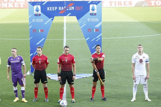 FLORENCE, ITALY - SEPTEMBER 19: Players and referees are seen in front of a sign that reads "Keep Racism Out" during the Serie A match between ACF Fiorentina and Torino FC at Stadio Artemio Franchi on September 19, 2020 in Florence, Italy. (Photo by Gabriele Maltinti/Getty Images) FLORENCE, ITALY - SEPTEMBER 19: Players and referees are seen in front of a sign that reads "Keep Racism Out" during the Serie A match between ACF Fiorentina and Torino FC at Stadio Artemio Franchi on September 19, 2020 in Florence, Italy. (Photo by Gabriele Maltinti/Getty Images)