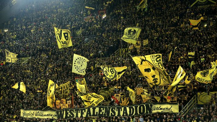 DORTMUND, NORTH RHINE-WESTPHALIA - OCTOBER 24:  Borussia Dortmund fans are seen during the Group A match of the UEFA Champions League between Borussia Dortmund and Club Atletico de Madrid at Signal Iduna Park on October 24, 2018 in Dortmund, Germany.  (Photo by Christof Koepsel/Bongarts/Getty Images)  DORTMUND, NORTH RHINE-WESTPHALIA - OCTOBER 24:  Borussia Dortmund fans are seen during the Group A match of the UEFA Champions League between Borussia Dortmund and Club Atletico de Madrid at Signal Iduna Park on October 24, 2018 in Dortmund, Germany.  (Photo by Christof Koepsel/Bongarts/Getty Images)