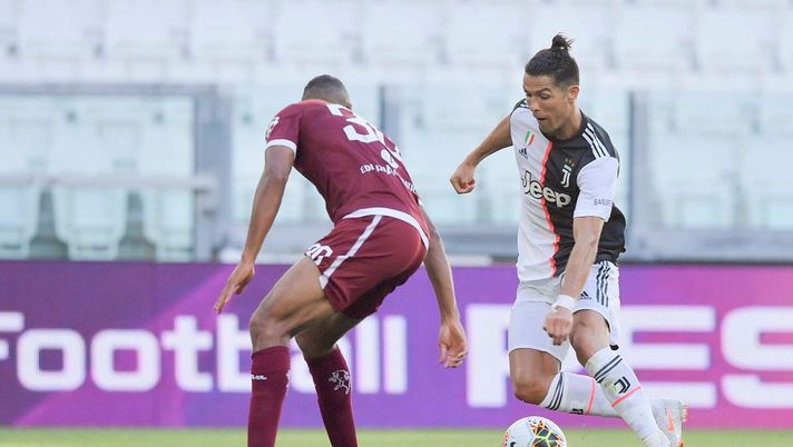 TURIN, ITALY - JULY 04: Cristiano Ronaldo of Juventus competes for the ball during the Serie A match between Juventus and Torino FC at Allianz Stadium on July 04, 2020 in Turin, Italy. (Photo by Daniele Badolato - Juventus FC/Juventus FC via Getty Images) 