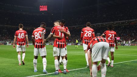 MILAN, ITALY - MAY 09: Christian Pulisic of AC Milan celebrates with team-mates after scoring the goal during the Serie A match between AC Milan and Bologna at Stadio Giuseppe Meazza on May 09, 2025 in Milan, Italy. (Photo by Claudio Villa/AC Milan via Getty Images)