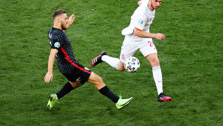 COPENHAGEN, DENMARK - JUNE 28: Nikola Vlasic of Croatia battles for possession with Aymeric Laporte of Spain during the UEFA Euro 2020 Championship Round of 16 match between Croatia and Spain at Parken Stadium on June 28, 2021 in Copenhagen, Denmark. (Photo by Wolfgang Rattay - Pool/Getty Images) COPENHAGEN, DENMARK - JUNE 28: Nikola Vlasic of Croatia battles for possession with Aymeric Laporte of Spain during the UEFA Euro 2020 Championship Round of 16 match between Croatia and Spain at Parken Stadium on June 28, 2021 in Copenhagen, Denmark. (Photo by Wolfgang Rattay - Pool/Getty Images)