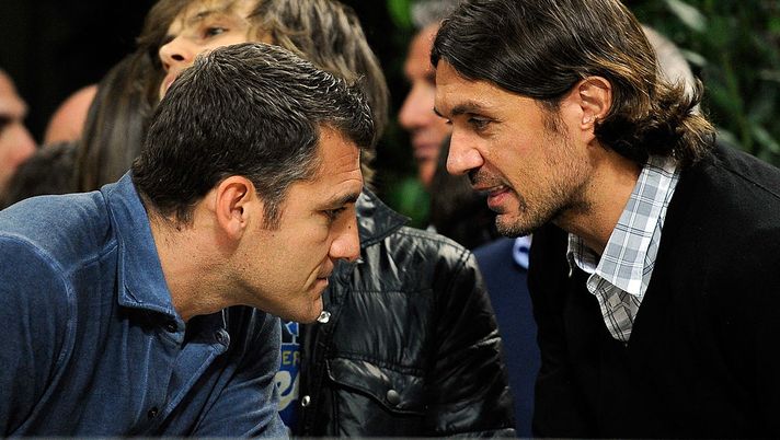 MILAN, ITALY - MARCH 28: Bobo Vieri and Paolo Maldini during the UEFA Champions League quarter final first leg match between AC Milan and Barcelona at Stadio Giuseppe Meazza on March 28, 2012 in Milan, Italy. (Photo by Claudio Villa/Getty Images) MILAN, ITALY - MARCH 28: Bobo Vieri and Paolo Maldini during the UEFA Champions League quarter final first leg match between AC Milan and Barcelona at Stadio Giuseppe Meazza on March 28, 2012 in Milan, Italy. (Photo by Claudio Villa/Getty Images)