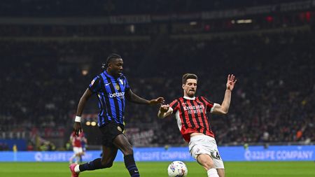 MILAN, ITALY - APRIL 02: Marcus Thuram of FC Internazionale competes for the ball with Matteo Gabbia of AC Milan during the Coppa Italia Semi Final match between AC Milan and FC Internazionale at Stadio Giuseppe Meazza on April 02, 2025 in Milan, Italy. (Photo by Mattia Ozbot - Inter/Inter via Getty Images)