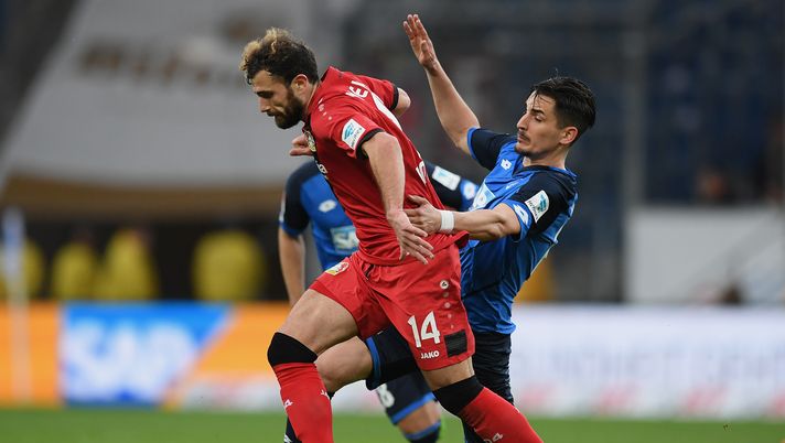 SINSHEIM, GERMANY - MARCH 18: Admir Mehmedi of Leverksuen is challenged by Benjamin Huebner of Hoffenheim during the Bundesliga match between TSG 1899 Hoffenheim and Bayer 04 Leverkusen at Wirsol Rhein-Neckar-Arena on March 18, 2017 in Sinsheim, Germany.  (Photo by Matthias Hangst/Bongarts/Getty Images) 