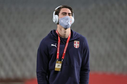 BELGRADE, SERBIA - MARCH 27: Dusan Vlahovic of Serbia is seen wearing a facemask prior to the FIFA World Cup 2022 Qatar qualifying match between Serbia and Portugal at FK Crvena Zvezda stadium on March 27, 2021 in Belgrade, Serbia. Sporting stadiums around Serbia remain under strict restrictions due to the Coronavirus Pandemic as Government social distancing laws prohibit fans inside venues resulting in games being played behind closed doors. (Photo by Srdjan Stevanovic/Getty Images) BELGRADE, SERBIA - MARCH 27: Dusan Vlahovic of Serbia is seen wearing a facemask prior to the FIFA World Cup 2022 Qatar qualifying match between Serbia and Portugal at FK Crvena Zvezda stadium on March 27, 2021 in Belgrade, Serbia. Sporting stadiums around Serbia remain under strict restrictions due to the Coronavirus Pandemic as Government social distancing laws prohibit fans inside venues resulting in games being played behind closed doors. (Photo by Srdjan Stevanovic/Getty Images)