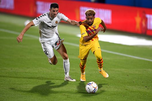 BARCELONA, SPAIN - SEPTEMBER 12: Konrad de la Fuente of FC Barcelona is challenged by Carlos Albarran of Gimnastic de Tarragona during the during the pre-season friendly match between FC Barcelona and Gimnastic de Tarragona at Estadi Johan Cruyff on September 12, 2020 in Barcelona, Spain. (Photo by David Ramos/Getty Images) BARCELONA, SPAIN - SEPTEMBER 12: Konrad de la Fuente of FC Barcelona is challenged by Carlos Albarran of Gimnastic de Tarragona during the during the pre-season friendly match between FC Barcelona and Gimnastic de Tarragona at Estadi Johan Cruyff on September 12, 2020 in Barcelona, Spain. (Photo by David Ramos/Getty Images)