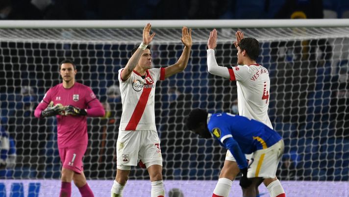 BRIGHTON, ENGLAND - DECEMBER 07: Jan Bednarek of Southampton (2L) and Jannik Vestergaard of Southampton (R) celebrate at the final whistle during the Premier League match between Brighton & Hove Albion and Southampton at American Express Community Stadium on December 07, 2020 in Brighton, England. A limited number of fans (2000) are welcomed back to stadiums to watch elite football across England. This was following easing of restrictions on spectators in tiers one and two areas only. (Photo by Mike Hewitt/Getty Images) BRIGHTON, ENGLAND - DECEMBER 07: Jan Bednarek of Southampton (2L) and Jannik Vestergaard of Southampton (R) celebrate at the final whistle during the Premier League match between Brighton & Hove Albion and Southampton at American Express Community Stadium on December 07, 2020 in Brighton, England. A limited number of fans (2000) are welcomed back to stadiums to watch elite football across England. This was following easing of restrictions on spectators in tiers one and two areas only. (Photo by Mike Hewitt/Getty Images)