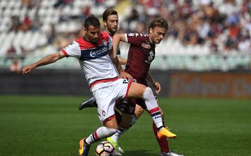  TURIN, ITALY - APRIL 15: Adem Ljajic (R) of FC Torino is challenged by Gian Marco Ferrari of FC Crotone during the Serie A match between FC Torino and FC Crotone at Stadio Olimpico di Torino on April 15, 2017 in Turin, Italy. (Photo by Valerio Pennicino/Getty Images)