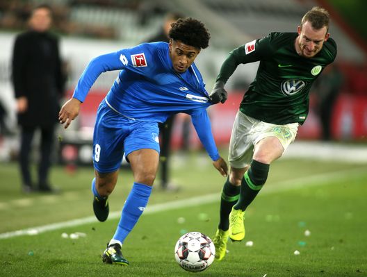 WOLFSBURG, GERMANY - DECEMBER 08: Reiss Nelson of Hoffenheim (L) fights for the ball with Maximilian Arnold of Wolfsburg during the Bundesliga match between VfL Wolfsburg and TSG 1899 Hoffenheim at Volkswagen Arena on December 8, 2018 in Wolfsburg, Germany. (Photo by Selim Sudheimer/Bongarts/Getty Images) WOLFSBURG, GERMANY - DECEMBER 08: Reiss Nelson of Hoffenheim (L) fights for the ball with Maximilian Arnold of Wolfsburg during the Bundesliga match between VfL Wolfsburg and TSG 1899 Hoffenheim at Volkswagen Arena on December 8, 2018 in Wolfsburg, Germany. (Photo by Selim Sudheimer/Bongarts/Getty Images)