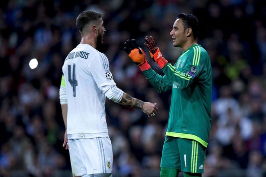 Goalkeeper Keylor Navas (R) of Real Madrid CF celebrates with his teammate Sergio Ramos during the UEFA Champions League Group A match between Real Madrid CF and Paris Saint-Germain at Estadio Santiago Bernabeu on November 3, 2015 in Madrid, Spain. Goalkeeper Keylor Navas (R) of Real Madrid CF celebrates with his teammate Sergio Ramos during the UEFA Champions League Group A match between Real Madrid CF and Paris Saint-Germain at Estadio Santiago Bernabeu on November 3, 2015 in Madrid, Spain.