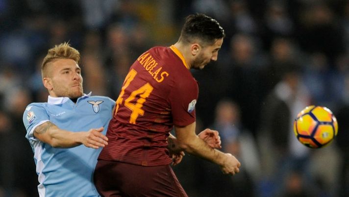 ROME, ROMA - MARCH 01: Ciro Immobile of SS Lazio compete for the ball with Kostas Manolas of AS Roma during the TIM Cup match between SS Lazio and AS Roma at Olimpico Stadium on March 1, 2017 in Rome, Italy. (Photo by Marco Rosi/Getty Images) ROME, ROMA - MARCH 01: Ciro Immobile of SS Lazio compete for the ball with Kostas Manolas of AS Roma during the TIM Cup match between SS Lazio and AS Roma at Olimpico Stadium on March 1, 2017 in Rome, Italy. (Photo by Marco Rosi/Getty Images)