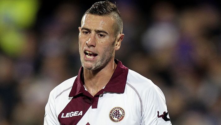 FLORENCE, ITALY - JANUARY 06: Leandro Rinaudo of AS Livorno Calcio reacts during the Serie A match between ACF Fiorentina and AS Livorno Calcio at Stadio Artemio Franchi on January 6, 2014 in Florence, Italy.  (Photo by Gabriele Maltinti/Getty Images)  FLORENCE, ITALY - JANUARY 06: Leandro Rinaudo of AS Livorno Calcio reacts during the Serie A match between ACF Fiorentina and AS Livorno Calcio at Stadio Artemio Franchi on January 6, 2014 in Florence, Italy.  (Photo by Gabriele Maltinti/Getty Images)