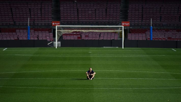 BARCELONA, SPAIN - MAY 20:  Andres Iniesta of FC Barcelona sits on the pitch at the end of La Liga match between Barcelona and Real Sociedad at Camp Nou on May 20, 2018 in Barcelona, Spain. The FC Barcelona captain played his last match with the FC Barcelona.  (Photo by David Ramos/Getty Images)  BARCELONA, SPAIN - MAY 20:  Andres Iniesta of FC Barcelona sits on the pitch at the end of La Liga match between Barcelona and Real Sociedad at Camp Nou on May 20, 2018 in Barcelona, Spain. The FC Barcelona captain played his last match with the FC Barcelona.  (Photo by David Ramos/Getty Images)