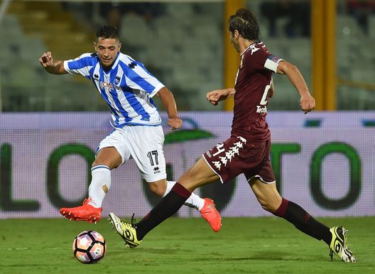 PESCARA, ITALY - SEPTEMBER 21: Gianluca Caprari of Pescara Calcio and Emiliano Moretti of FC Torino in action during the Serie A match between Pescara Calcio and FC Torino at Adriatico Stadium on September 21, 2016 in Pescara, Italy. (Photo by Giuseppe Bellini/Getty Images) PESCARA, ITALY - SEPTEMBER 21: Gianluca Caprari of Pescara Calcio and Emiliano Moretti of FC Torino in action during the Serie A match between Pescara Calcio and FC Torino at Adriatico Stadium on September 21, 2016 in Pescara, Italy. (Photo by Giuseppe Bellini/Getty Images)