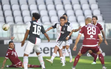  TURIN, ITALY - JULY 04: Paulo Dybala (C) of Juventus scores the opening goal during the Serie A match between Juventus and Torino FC at Allianz Stadium on July 4, 2020 in Turin, Italy. (Photo by Valerio Pennicino/Getty Images)