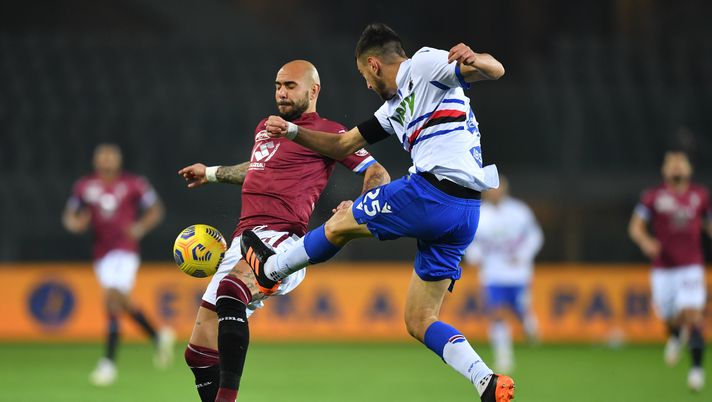 TURIN, ITALY - NOVEMBER 30: Simone Zaza of Torino F.C. battles for possession with Alex Ferrari of U.C. Sampdoria during the Serie A match between Torino FC and UC Sampdoria at Stadio Olimpico di Torino on November 30, 2020 in Turin, Italy. Sporting stadiums around Italy remain under strict restrictions due to the Coronavirus Pandemic as Government social distancing laws prohibit fans inside venues resulting in games being played behind closed doors. (Photo by Valerio Pennicino/Getty Images) TURIN, ITALY - NOVEMBER 30: Simone Zaza of Torino F.C. battles for possession with Alex Ferrari of U.C. Sampdoria during the Serie A match between Torino FC and UC Sampdoria at Stadio Olimpico di Torino on November 30, 2020 in Turin, Italy. Sporting stadiums around Italy remain under strict restrictions due to the Coronavirus Pandemic as Government social distancing laws prohibit fans inside venues resulting in games being played behind closed doors. (Photo by Valerio Pennicino/Getty Images)