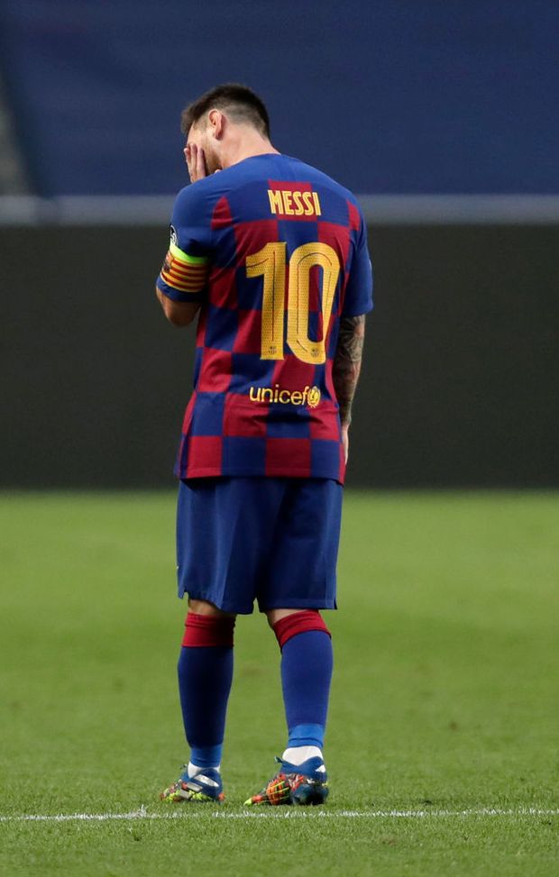 LISBON, PORTUGAL - AUGUST 14: Lionel Messi of FC Barcelona looks dejected after his team concede during the UEFA Champions League Quarter Final match between Barcelona and Bayern Munich at Estadio do Sport Lisboa e Benfica on August 14, 2020 in Lisbon, Portugal. (Photo by Manu Fernandez/Pool via Getty Images) LISBON, PORTUGAL - AUGUST 14: Lionel Messi of FC Barcelona looks dejected after his team concede during the UEFA Champions League Quarter Final match between Barcelona and Bayern Munich at Estadio do Sport Lisboa e Benfica on August 14, 2020 in Lisbon, Portugal. (Photo by Manu Fernandez/Pool via Getty Images)