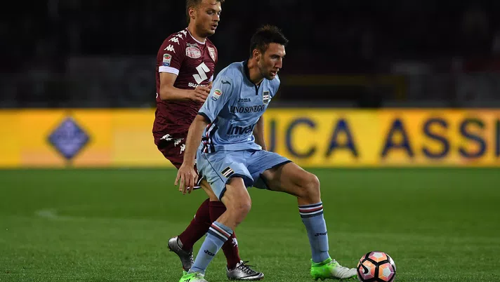 TURIN, ITALY - APRIL 29:  Adem Ljajic (L) of FC Torino competes with Vasco Regini of UC Sampdoria during the Serie A match between FC Torino and UC Sampdoria at Stadio Olimpico di Torino on April 29, 2017 in Turin, Italy.  (Photo by Valerio Pennicino/Getty Images)