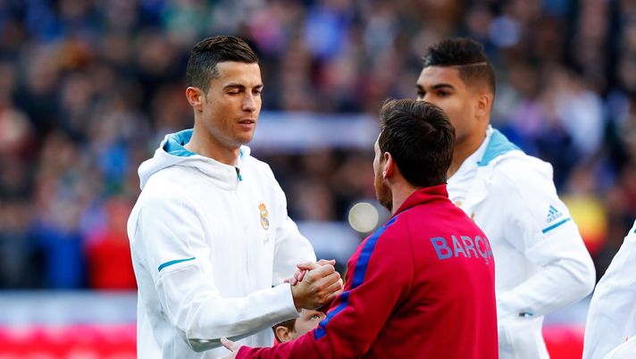 MADRID, SPAIN - DECEMBER 23: Cristiano Ronaldo of Real Madrid greets Lionel Messi of Barcelona prior to the La Liga match between Real Madrid and Barcelona at Estadio Santiago Bernabeu on December 23, 2017 in Madrid, Spain. (Photo by Gonzalo Arroyo Moreno/Getty Images) MADRID, SPAIN - DECEMBER 23: Cristiano Ronaldo of Real Madrid greets Lionel Messi of Barcelona prior to the La Liga match between Real Madrid and Barcelona at Estadio Santiago Bernabeu on December 23, 2017 in Madrid, Spain. (Photo by Gonzalo Arroyo Moreno/Getty Images)
