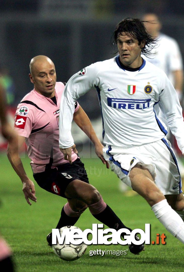  PALERMO, ITALY - NOVEMBER 26:  Santiago Solari of Inter Milan challenges Eugenio Corini of Palermo during Italian serie A football match against Palermo at Palermo's Renzo Barbera Stadium, 26 November 2006 in Palermo, Italy.  (Photo by New Press/Getty Images) 