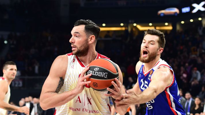 ISTANBUL, TURKEY - JANUARY 14: Christian Burns, #23 of AX Armani Exchange Milan competes with Alec Peters, #25 of Anadolu Efes Istanbul during the 2019/2020 Turkish Airlines EuroLeague Regular Season Round 19 match between Anadolu Efes Istanbul and AX Armani Exchange Milan at Sinan Erdem Dome on January 14, 2020 in Istanbul, Turkey. (Photo by Aykut Akici/Euroleague Basketball via Getty Images) ISTANBUL, TURKEY - JANUARY 14: Christian Burns, #23 of AX Armani Exchange Milan competes with Alec Peters, #25 of Anadolu Efes Istanbul during the 2019/2020 Turkish Airlines EuroLeague Regular Season Round 19 match between Anadolu Efes Istanbul and AX Armani Exchange Milan at Sinan Erdem Dome on January 14, 2020 in Istanbul, Turkey. (Photo by Aykut Akici/Euroleague Basketball via Getty Images)