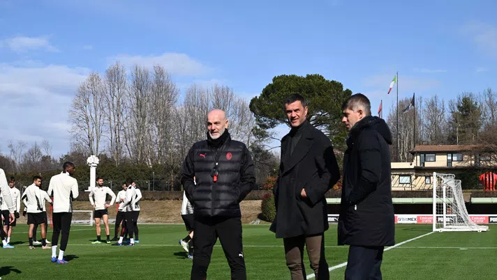 CAIRATE, ITALY - FEBRUARY 16: Head coach AC Milan Stefano Pioli, Technical Area Director AC Milan Paolo Maldini and AC Milan Sport Director Frederic Massara attend during an AC Milan training session at Milanello on February 16, 2022 in Cairate, Italy. (Photo by Claudio Villa/AC Milan via Getty Images)