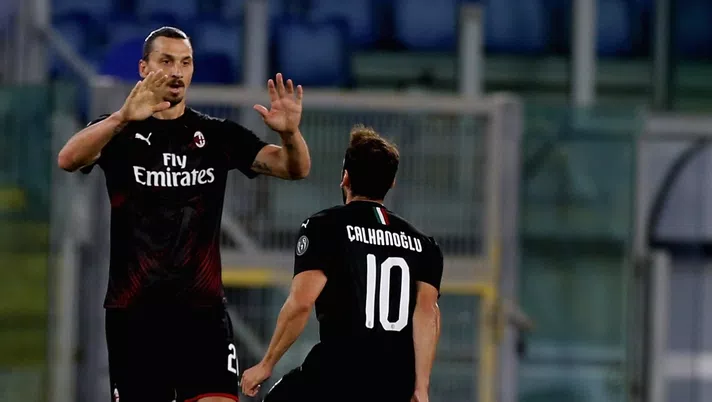 Ibrahimovic e Calhanoglu (credits: Getty Images)