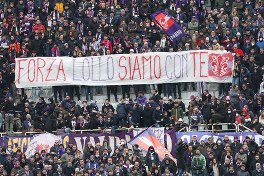 FLORENCE, ITALY - MARCH 06: Fans of ACF Fiorentina during the Serie A match between ACF Fiorentina and Hellas Verona FC at Stadio Artemio Franchi on March 6, 2022 in Florence, Italy. (Photo by Gabriele Maltinti/Getty Images) FLORENCE, ITALY - MARCH 06: Fans of ACF Fiorentina during the Serie A match between ACF Fiorentina and Hellas Verona FC at Stadio Artemio Franchi on March 6, 2022 in Florence, Italy. (Photo by Gabriele Maltinti/Getty Images)