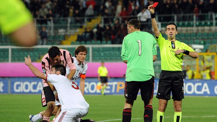 PALERMO, ITALY - APRIL 01: The referee Gianluca Aureliano (R) shows a a red card to Antonio Donnarumma (2nd R) goalkeeper of Milan as Marco Giovio (L) of Palermo lies injured during the Juvenile Tim Cup Final, First Leg match between Palermo and Milan at Stadio Renzo Barbera on April 1, 2010 in Palermo, Italy. (Photo by Tullio M. Puglia/Getty Images) PALERMO, ITALY - APRIL 01: The referee Gianluca Aureliano (R) shows a a red card to Antonio Donnarumma (2nd R) goalkeeper of Milan as Marco Giovio (L) of Palermo lies injured during the Juvenile Tim Cup Final, First Leg match between Palermo and Milan at Stadio Renzo Barbera on April 1, 2010 in Palermo, Italy. (Photo by Tullio M. Puglia/Getty Images)