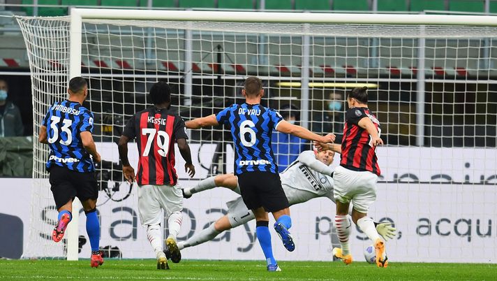 MILAN, ITALY - OCTOBER 17: Samir Handanovic of FC Internazionale saves a penalty-kick of Zlatan Ibrahimovic of AC Milan during the Serie A match between FC Internazionale and AC Milan at Stadio Giuseppe Meazza on October 17, 2020 in Milan, Italy. (Photo by Claudio Villa - Inter/Inter via Getty Images) MILAN, ITALY - OCTOBER 17: Samir Handanovic of FC Internazionale saves a penalty-kick of Zlatan Ibrahimovic of AC Milan during the Serie A match between FC Internazionale and AC Milan at Stadio Giuseppe Meazza on October 17, 2020 in Milan, Italy. (Photo by Claudio Villa - Inter/Inter via Getty Images)