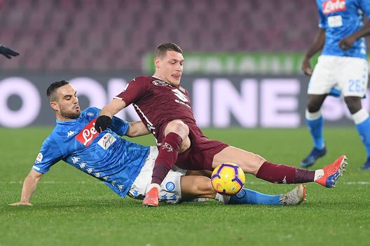  NAPLES, ITALY - FEBRUARY 17: Nikola Maksimovic of SSC Napoli vies Andrea Belotti of Torino FC during the Serie A match between SSC Napoli and Torino FC at Stadio San Paolo on February 17, 2019 in Naples, Italy. (Photo by Francesco Pecoraro/Getty Images) 