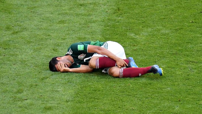 SAMARA, RUSSIA - JULY 02:  Carlos Vela of Mexico lies on the pitch injured during the 2018 FIFA World Cup Russia Round of 16 match between Brazil and Mexico at Samara Arena on July 2, 2018 in Samara, Russia.  (Photo by Hector Vivas/Getty Images) 