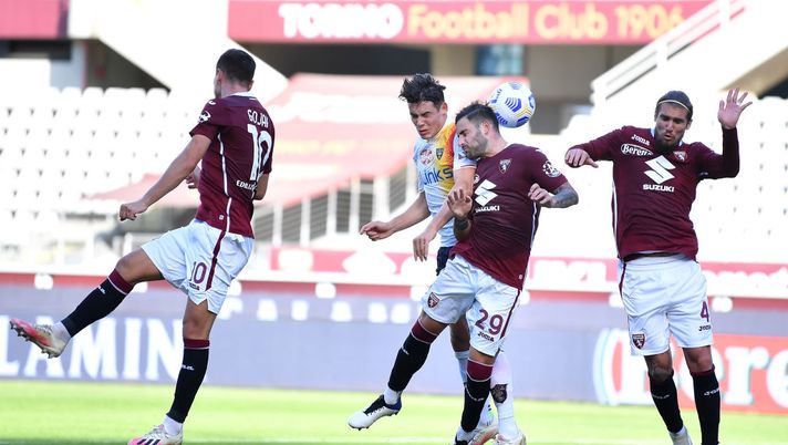 TURIN, ITALY - OCTOBER 28:  Nicola Murru (R) of Torino FC clashes with Mariusz Stepinski of US Lecce during the Coppa Italia match between Torino FC and US Lecce at Stadio Olimpico Grande Torino on October 28, 2020 in Turin, Italy.  (Photo by Valerio Pennicino/Getty Images) 