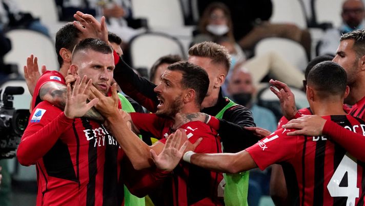 TURIN, ITALY - SEPTEMBER 19: Ante Rebic of AC Milan celebrates with teammates after scoring their side's first goal during the Serie A match between Juventus and AC Milan at the Allianz Stadium in Turin, Italy on September 19, 2021 in Turin, Italy. (Photo by Pier Marco Tacca/Getty Images) TURIN, ITALY - SEPTEMBER 19: Ante Rebic of AC Milan celebrates with teammates after scoring their side's first goal during the Serie A match between Juventus and AC Milan at the Allianz Stadium in Turin, Italy on September 19, 2021 in Turin, Italy. (Photo by Pier Marco Tacca/Getty Images)