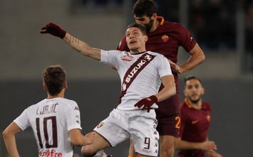  ROME, ITALY - FEBRUARY 19: Federico Fazio of AS Roma competes for the ball with Andrea Belotti #9 of FC Torino during the Serie A match between AS Roma and FC Torino at Stadio Olimpico on February 19, 2017 in Rome, Italy. (Photo by Paolo Bruno/Getty Images)