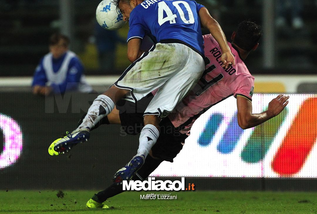  BRESCIA, ITALY - SEPTEMBER 02:  Tommaso Cancellotti of Brescia Calcio competes for the ball with Gabriele Rolando of US Citta di Palermo during the Serie B between Brescia Calcio and US Citta di Palermo at Stadio Mario Rigamonti on September 2, 2017 in Brescia, Italy.  (Photo by Marco Luzzani/Getty Images) 