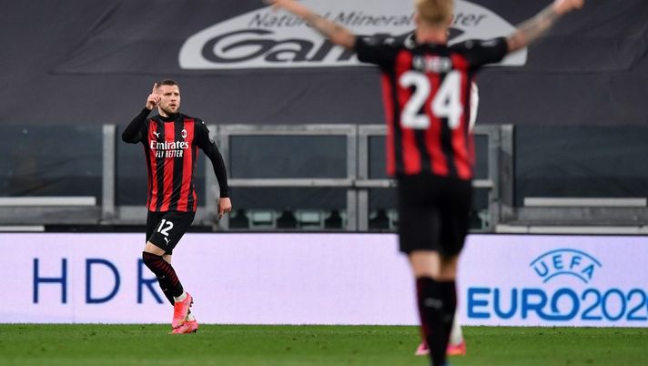 TURIN, ITALY - MAY 09: Ante Rebic of A.C. Milan celebrates with team mates after scoring their side's second goal during the Serie A match between Juventus and AC Milan at on May 09, 2021 in Turin, Italy. Sporting stadiums around Italy remain under strict restrictions due to the Coronavirus Pandemic as Government social distancing laws prohibit fans inside venues resulting in games being played behind closed doors. (Photo by Valerio Pennicino/Getty Images) TURIN, ITALY - MAY 09: Ante Rebic of A.C. Milan celebrates with team mates after scoring their side's second goal during the Serie A match between Juventus and AC Milan at on May 09, 2021 in Turin, Italy. Sporting stadiums around Italy remain under strict restrictions due to the Coronavirus Pandemic as Government social distancing laws prohibit fans inside venues resulting in games being played behind closed doors. (Photo by Valerio Pennicino/Getty Images)